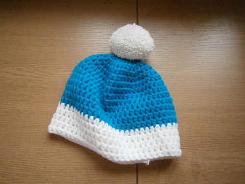 Gehäkelte wintermütze mit - gehäkelte,